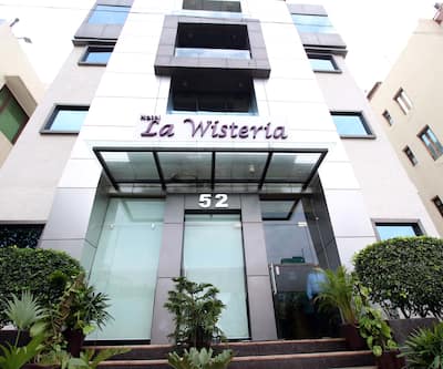 https://imgcld.yatra.com/ytimages/image/upload/t_hotel_yatra_city_desktop/v1427819136/Domestic Hotels/Hotels_New Delhi/Hotel La Wisteria/Exterior_7.jpg